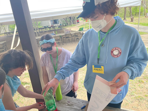 Senior Magnus Vierck and his girlfriend Hannah Pallos use plastic bottles to make bottle rockets.