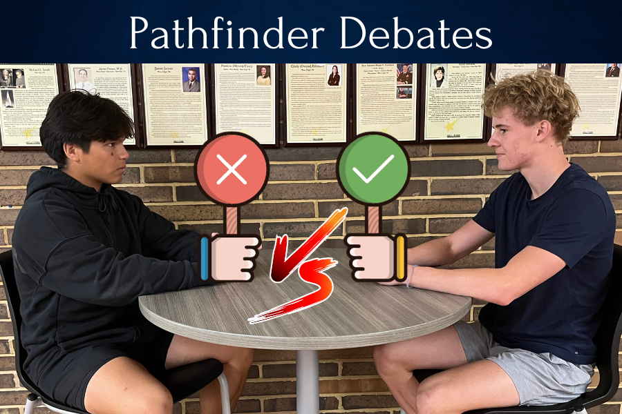 Senior Chris Gray and senior Max Brophy get ready to face off in their debate on gun control in America. Both of them have been discussing political issues since middle school history class. “I think it’s important to have these difficult conversations so that we can all learn from each other on important issues,” Gray said.
