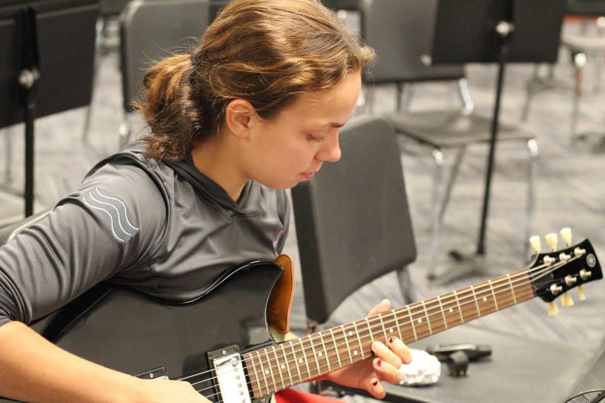 ”Sophomore year is going really well. I have gotten so many opportunities this year and [it has been] a big step up from last year. I didnt think that was possible. I [enjoy] playing guitar in [a] jazz band. It has led me to have more guitar [playing] skills. I get to learn how to play good riffs and get more familiar with the fretboard, which is something that I wasnt able to do by myself without a push. I love the guitar because all my idols play it, like Jimi Hendrix [and] anybody who has ever play[ed] guitar, like Rick Rubin. My band teacher has [pushed me] because I wasn’t familiar with any of the [chords] charts. I didnt even even know how to read music before this year, so that was pretty cool just to be forced into that and learn music theory. [Advice I have for new musicians is to] practice as hard as you can build up those calluses. Got to make it hurt and then you’ll be fine.” - Addison Smith, 10 
