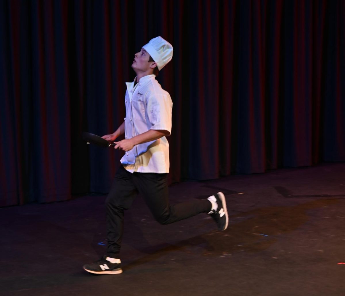 Senior Cameron Hickert tilts his head upwards, running across the stage as he pretends to be a chef. Mr. Longhorn contestants prepared for their acts across three practices. “I’m excited to perform with my friends and have a lot of fun. It’s senior year, so I’m trying to get more involved with stuff this year. I’m putting on a little dance with my friends, [seniors] Caden Keller and Justin Grove,” Hickert said.