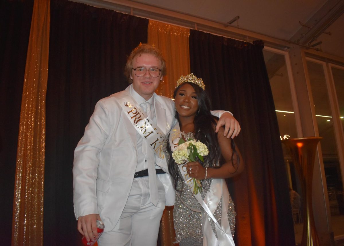 On Apr. 27 at the Hilton DoubleTree Hotel in Chesterfield, Mo., seniors Lincoln Atkinson and Tristen Banks pose together after winning prom king and queen. Every year, junior and senior prom courts are celebrated for running for king and queen. “It’s a nervous feeling waiting to see who’ll be crowned, especially when Dr. McCabe walks right past you,” Banks said. 