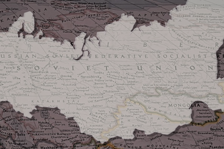 The current map of Russia is superimposed over a map of the USSR, its past incarnation