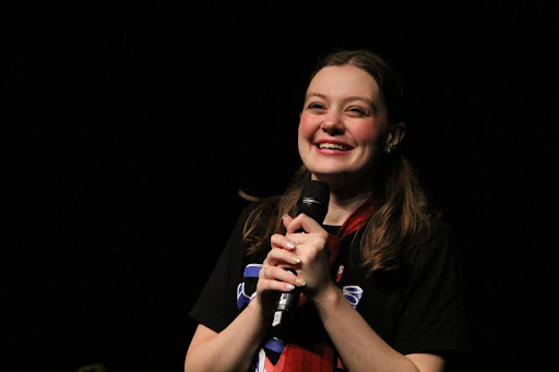 Beaming at the audience, sophomore Juliana Rodgers performs in the theatre department’s improvisation show on May 3. Improv is a type of theater with formatted games and a one word prompt, typically from the audience. Rodgers has participated in five improv shows over the past two years with the Running with Scissors club and earned the position of junior improv captain. “My favorite thing about the show was Senior Panprov— all of the seniors on the team create a scene where they can play any [improv] game,” Rodgers said. “It was super cool because it was chaotic, but it was a good scene.”