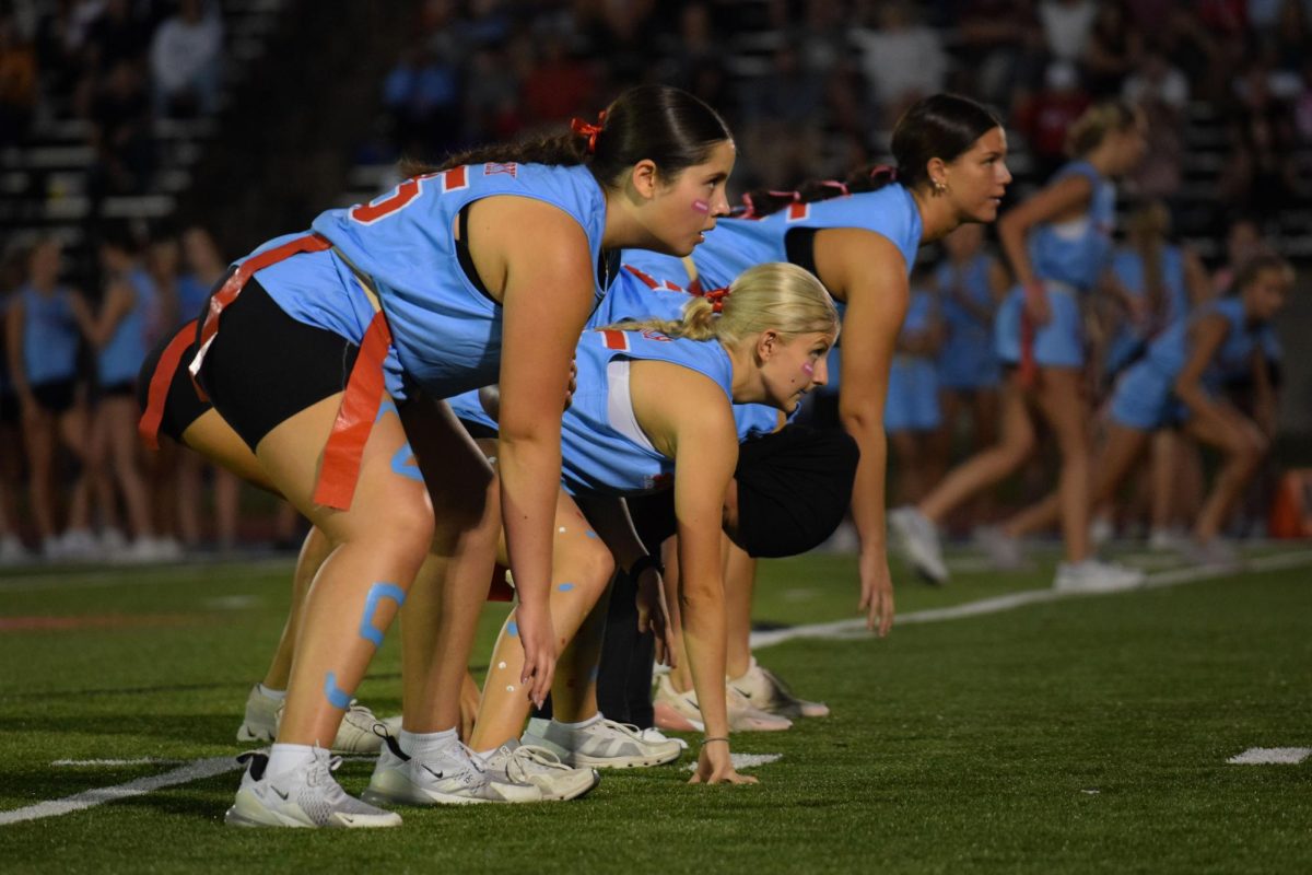 Ready for the snap, senior Nicole Chocheva sets up to protect her quarterback as a part of the offensive line. Coming off of a win the previous year, the pressure was on to secure a back-to-back victory for the class of 2025. “I was scared because I didn't want to lose, but it was such a great experience. When we won, I was really excited, I was feeling hyped for myself and for the whole senior class — not only did we win Powderpuff, but we got those bragging rights. Fair and square,” Chocheva said.