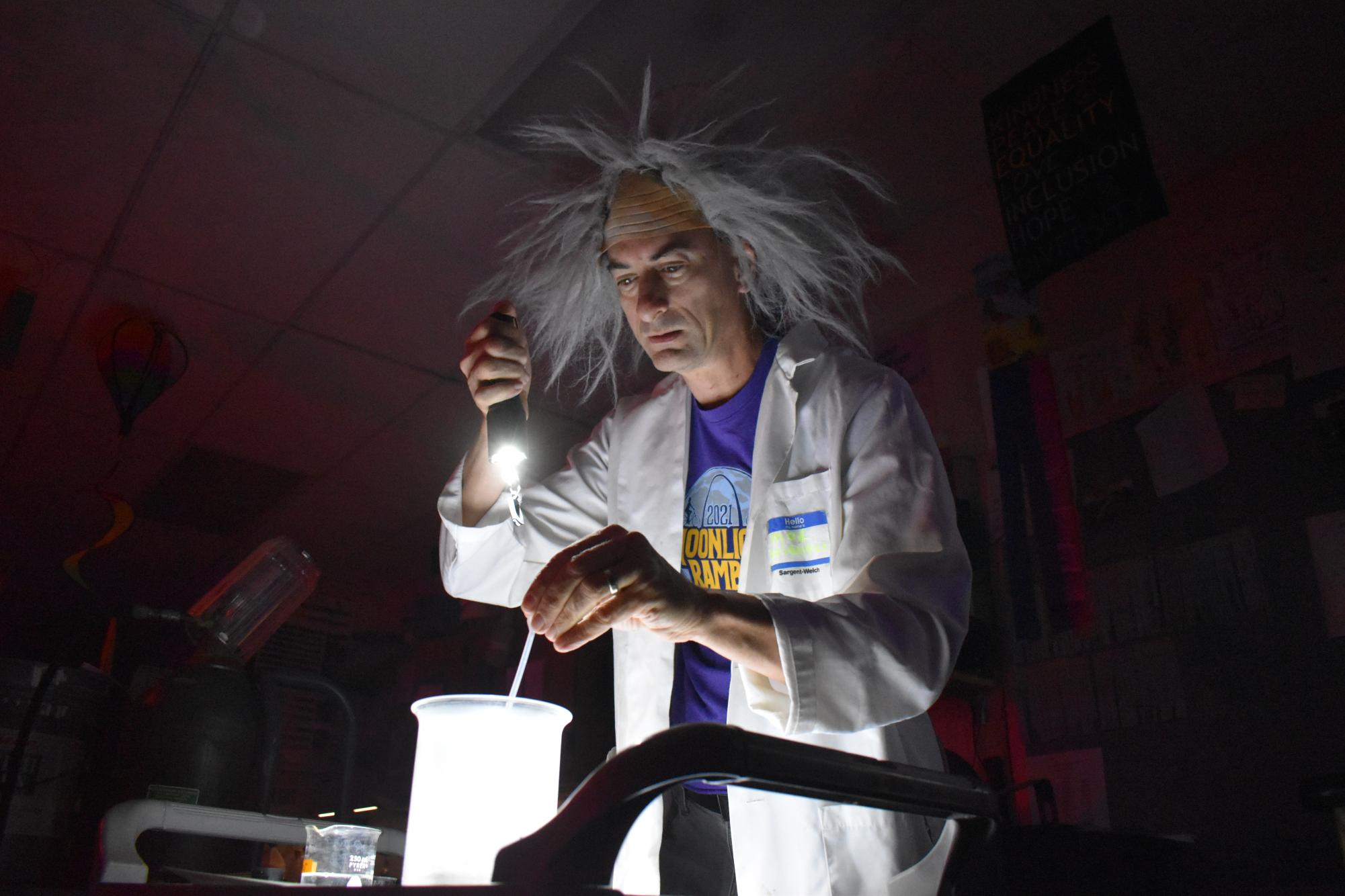 Blending together a concoction for a science experiment, science teacher Joel Anderson scares his students by bringing excitement and thrill into his classroom for his annual Halloween show.  It took about six weeks for Anderson to set up his classroom for the show. “It’s pure terror. I came up with this idea a couple decades ago to do something fun for Halloween. So I pretend to be this mad scientist [that creates] a Frankenstein-like creature [with the class], learning a little bit of science along the way and [then ending] with a laser show. It’s just for fun; entertainment value,” Anderson said.