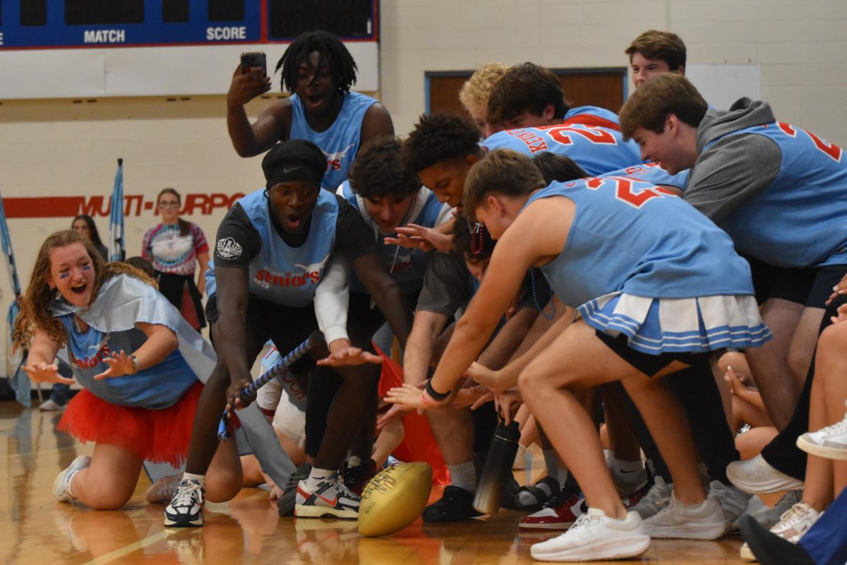 Adding to the excitement of the annual Homecoming Queen reveal, senior Archie Arnold, with other members of the senior student section, adds his own twist to the announcement. As a varsity football player, the pep rally was Arnold’s sole opportunity to closely interact with his peers in a spirited setting throughout the season. “[Being in] the student section was exhilarating. All of the seniors are coming together, and there is so much progression from freshman year to now. We've matured, and we're all basically family now,” Arnold said.
