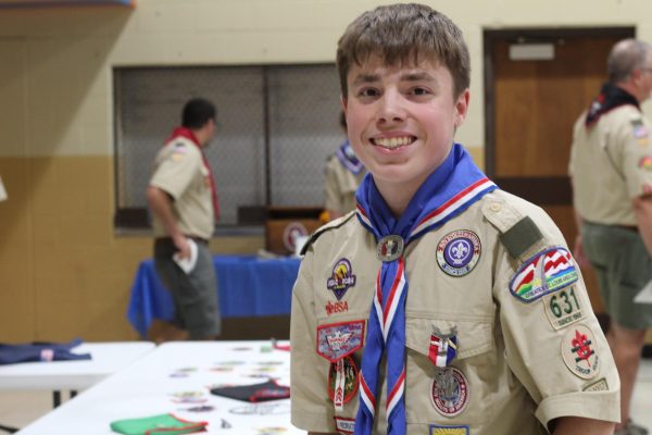 Sophomore Isaiah Meese smiles after his Eagle Scout Ceremony. Meese has participated in the scouting program since first grade, learning new aspects of life and growing a community of a second family. “I almost didn’t do [boy scouting], but I'm glad I eventually did start doing it. I regret that I wasn't [working towards Eagle Scout during COVID]. It might not always seem like the most rewarding thing, but if you put your time into it, there's a good chance you'll get quite a lot out of it: friends, new activities and hobbies, or just more experience,” Meese said. 
