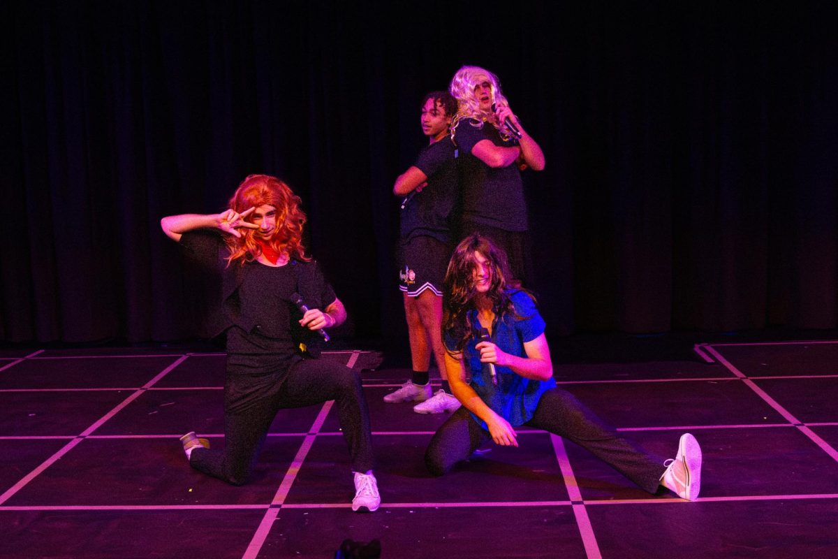 Striking a final pose, seniors Bart Connors, Gavin Hamlin, Colin Hughes and Henry Wild parody The Barden Bellas’ Finals performance from “Pitch Perfect” during the talent portion of Mr. Longhorn. The group practiced at Wild’s house for hours to memorize the dance and song; it was difficult for Hughes in particular as he had never seen the movie before. “I was pretty nervous, and it didn't help when [Connors] didn't have his mic. I was standing out there for like 30 seconds; I didn't know what was going on, and then I looked back and he was not there. But, once I was performing, it was really fun. I ran up into the stands and high-fived people,” Hughes said.