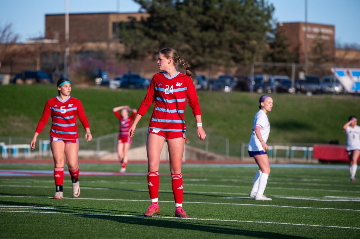 Junior Kate Hardy looks back to her Parkway West teammates on March 31 in a match against Affton. The Longhorns went on to defeat Affton with a score 8-0. “Injuries were the biggest challenge this season, because a lot of us had to adjust to playing different positions we weren’t used to. We kept a team-first mentality, which definitely helped,” Hardy said.
