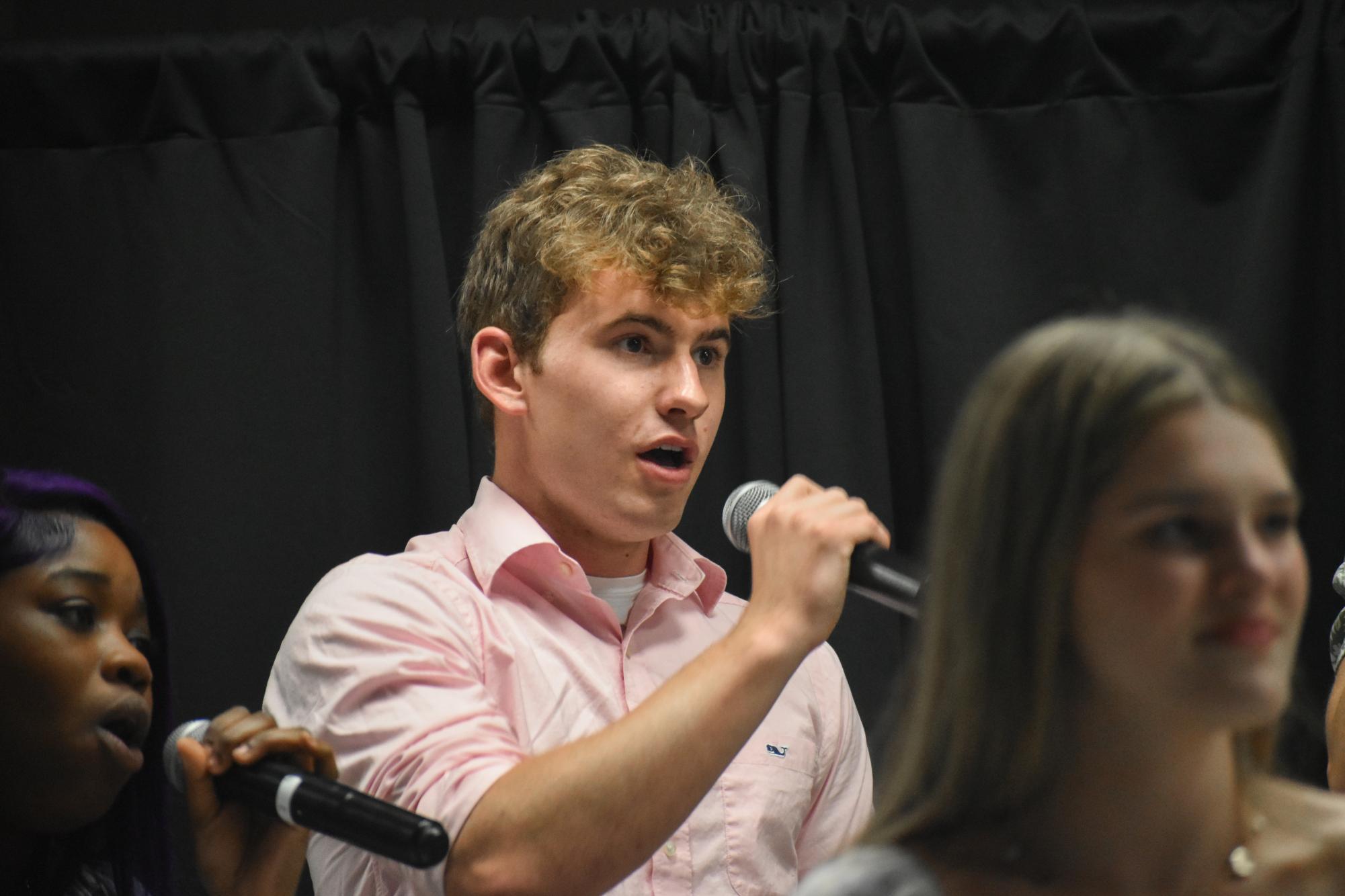 Blending harmonies with dynamic control, senior Spencer Rahm takes the stage as part of the jazz choir's spring performance. Jazz Coffee House took place on April 22, marking the culmination of months of preparation by West High’s musicians. “To me, [choir] is an opportunity every day to get to sing with my friends and work on our songs that we have concerts for. [Seeing] the results after working together with people is really rewarding. Jazz Coffee House concert was a reflection and a result of all the hard work we've put in the last three months,” Rahm said.