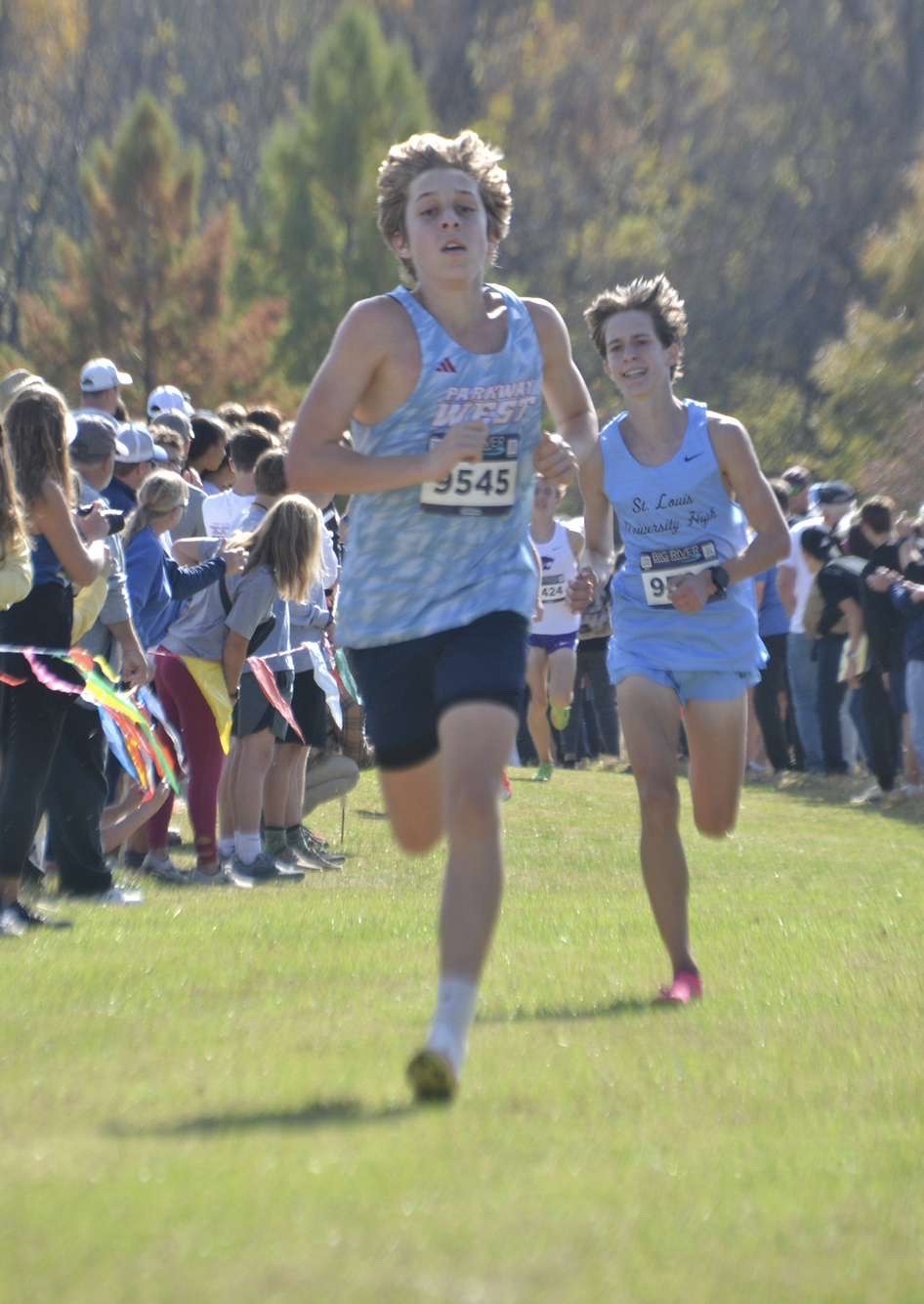 Junior Wade Patten runs through the finish line as his opponents fall behind. Patten has been running his whole life. “I love to run because when I was younger, I would always go to my older brother’s meets, and that encouraged me to run more and get better at it,” Patten said.
