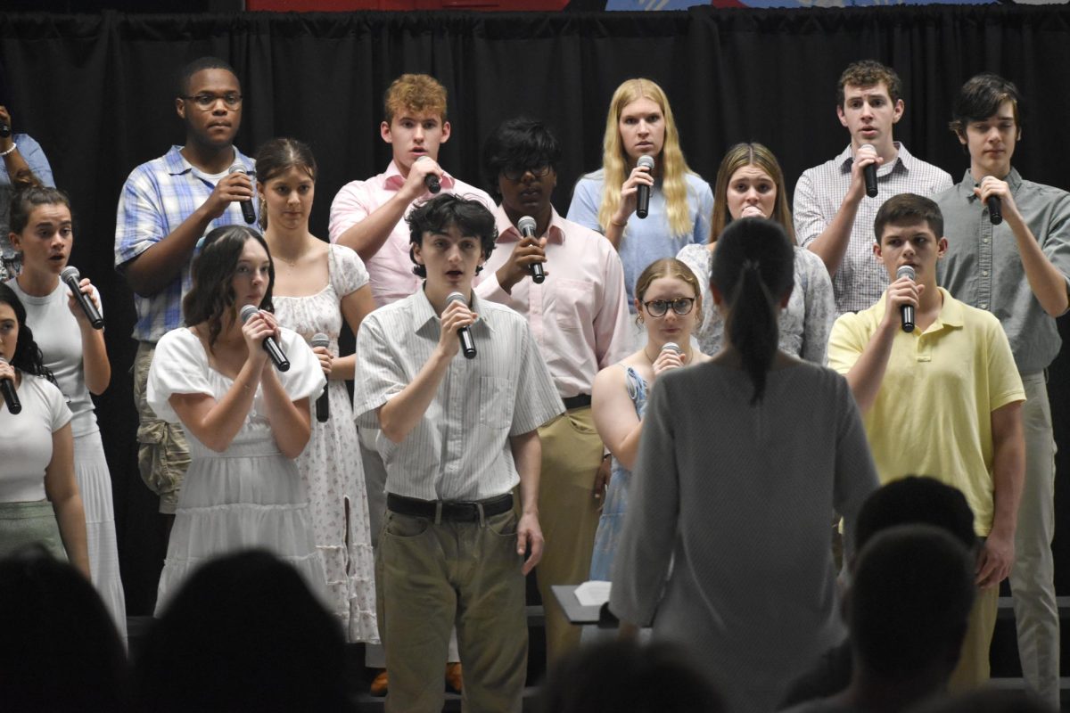 Marking his final jazz choir appearance, Mullen blends with the ensemble onstage at the Jazz Coffee House concert. Mullen has been involved in choir all four years at West, participating in the concert choir, the chamber choir and the jazz choir throughout his journey. “[The] choir [is] a place of belonging at school. I love singing, and I've always sung, so I'm really grateful to be able to do it at school with people who also like it. This was also my last choir performance ever. It was really emotional, but exciting to get to do it one last time,” Mullen said.