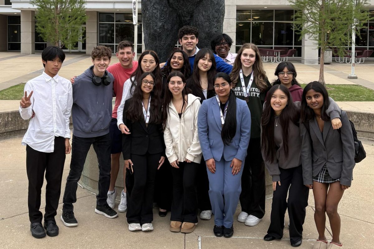 Posing outside Missouri State University, students take a group photo following the MSHSAA Speech and Debate State Tournament. The competition spanned two days, adding up to nearly 60 rounds between the team. “This was all of our first times at States, and that made this experience unique 一 no one knew what to expect. Getting one last tournament with this specific team and our seniors was sentimental, but I’m excited to get going again next season,” sophomore Aagi Gudipati said.