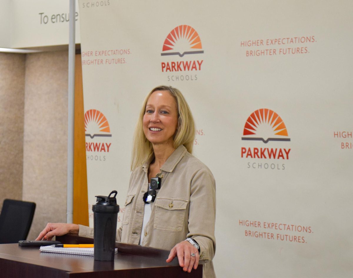 Leaning on the podium, superintendent Melissa Schneider speaks to Parkway journalism students during a press conference. Schneider joined Parkway in July after working in the Thompson School District in Colorado. “My plan [to bond with students] is to get things on my calendar as much as possible. For example, being in [classes] is very special to me. I am trying to be opportunistic [meeting] kids [and] being in [the school] buildings. I have all the sports schedules and the fine arts schedules on my calendar, so that when I'm available, I can get to them,” Schneider said. 