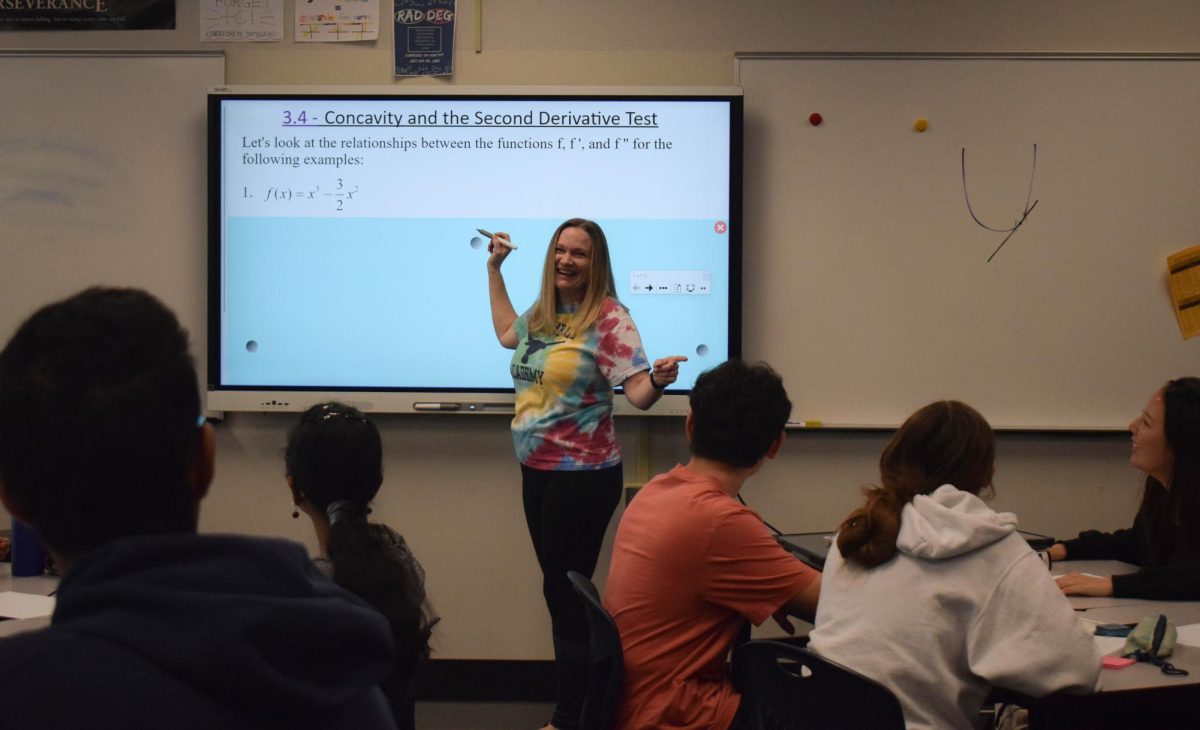 Amid teaching a lesson to her AP Calculus BC class, Kristin Judd jokes alongside her students in their funny remarks. Judd has always enjoyed keeping the mood light in her classroom, along with on the volleyball court. “[I enjoy] that side talk where you see [or] overhear a conversation and chime in, or somebody says something funny,” Judd said.
