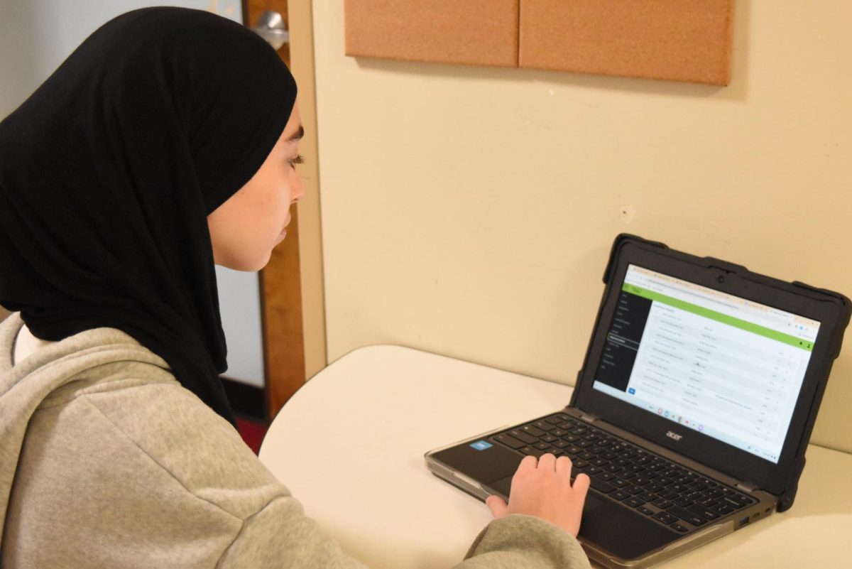 Sophomore Maryem Hidic signs up for an academic lab through Infinite Campus, a grading and scheduling software. Some students enjoyed selecting their responsive schedule in a method that was used school-wide last year. “I think it's more inconvenient now, because I can't change [my classes] the day of, if I have a big test coming and I forget about it, I can't change [my class],” sophomore Alisha Singh said.
