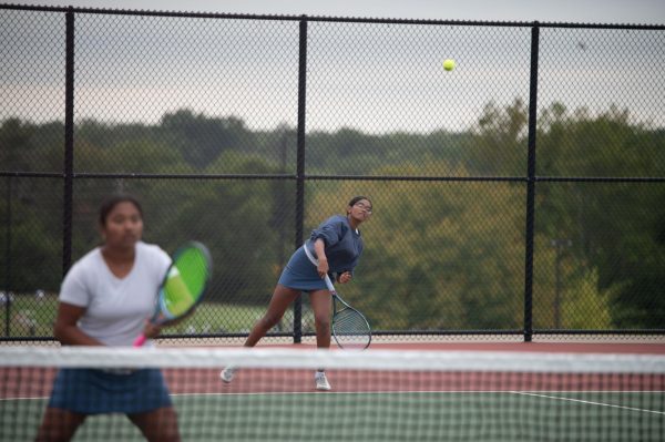 Sophomore Shree Sikkal Kumar serves the ball across the court in a match against Lindbergh. Sikkal Kumar has been a varsity member of the varsity girls’ tennis team for two years, helping her earn the number two rank in Class 2 District 2.“When matches are close, it’s easy to get nervous, but I [ground] myself by[staying] confident and ready to play,” Sikkal Kumar said.
