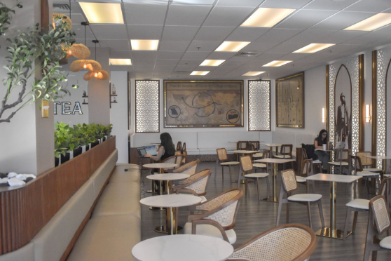 Enjoying the cafe, people work on their laptops. Most people go to Qahwatea Coffee to study, hang out with friends, or just to enjoy a sweet treat. 
