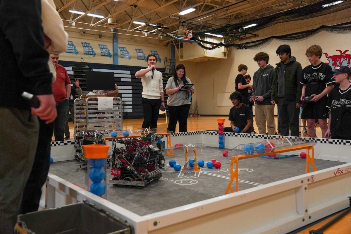 As onlookers watched robots battling it out in the main gym, they were met by a familiar face. Ladue Horton Watkins High School senior and former competitor Ben Reiser jumped from match to match, expertly detailing the maneuvers, design choices and current standings of each team. “Two years ago, when I started robotics, we were really good friends. [Reiser] unfortunately had to drop out of his team, so now he commentates for certain competitions and is a [well-known] figure in robotics,” junior Adam Thomas said.