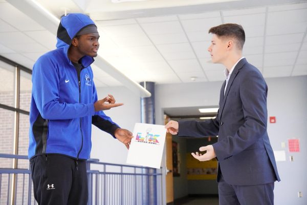 Sophomore Jamal McNeal argues with sophomore Eric Thomas about which team is the best in the Super Bowl. The two are fans of the respective teams playing in the Super Bowl. “I've been a pretty big fan of football for quite a long time, and the Super Bowl has always been a really big interest of mine, especially this year, because it's happening on my birthday,” Thomas said. “The atmosphere of football games, especially ones as big as the Super Bowl, is always exhilarating and fun, and you really can't find it anywhere else.”