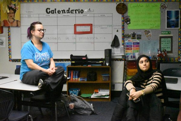 Spanish teacher Jessica Verywest and senior Zoya Hasan listen in on a conversation related to Dance Marathon funds. Dance Marathon is making the final preparations for its event on April 22, 2026. Senior Zoya Hasan talks about how she has enjoyed the process of preparing for Dance Marathon so far this year. “My favorite part of going there [Dance Marathon] with my friends Friday mornings, its been a nice routine that we get to promote Dance Marathon with,” said Hasan.