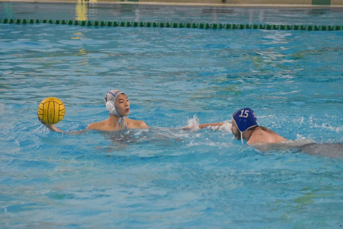 Gripping the water polo ball, senior Eugene Wu scans the pool, looking for an open teammate. In the fall, Wu plans to study engineering at the University of Illinois, building off of fundamental skills he learned throughout his water polo career. “I feel proud of how far I’ve come, from learning the basics to becoming a leader on the team. Water polo has been such a big part of my life, so it’s weird knowing this is my final season,” Wu said. 