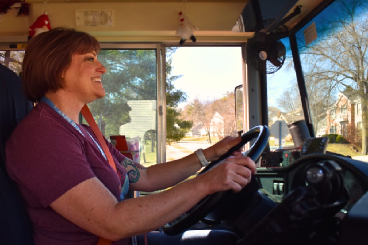 Steering Bus 100, bus driver Nikki Wright maneuvers through the streets to get students home safely. Wright has been driving school buses for four years. “I started bus driving around 2021 when there was a shortage of bus drivers. I heard about the shortage and thought that it wasn’t a bad idea to become a bus driver,” Wright said.